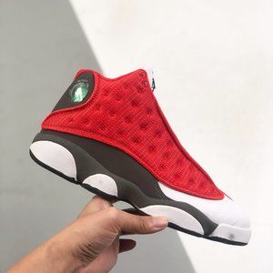 Air Jordan 13 Retro" high-top AJ13 wraps the shoe body with dark green pebbled l